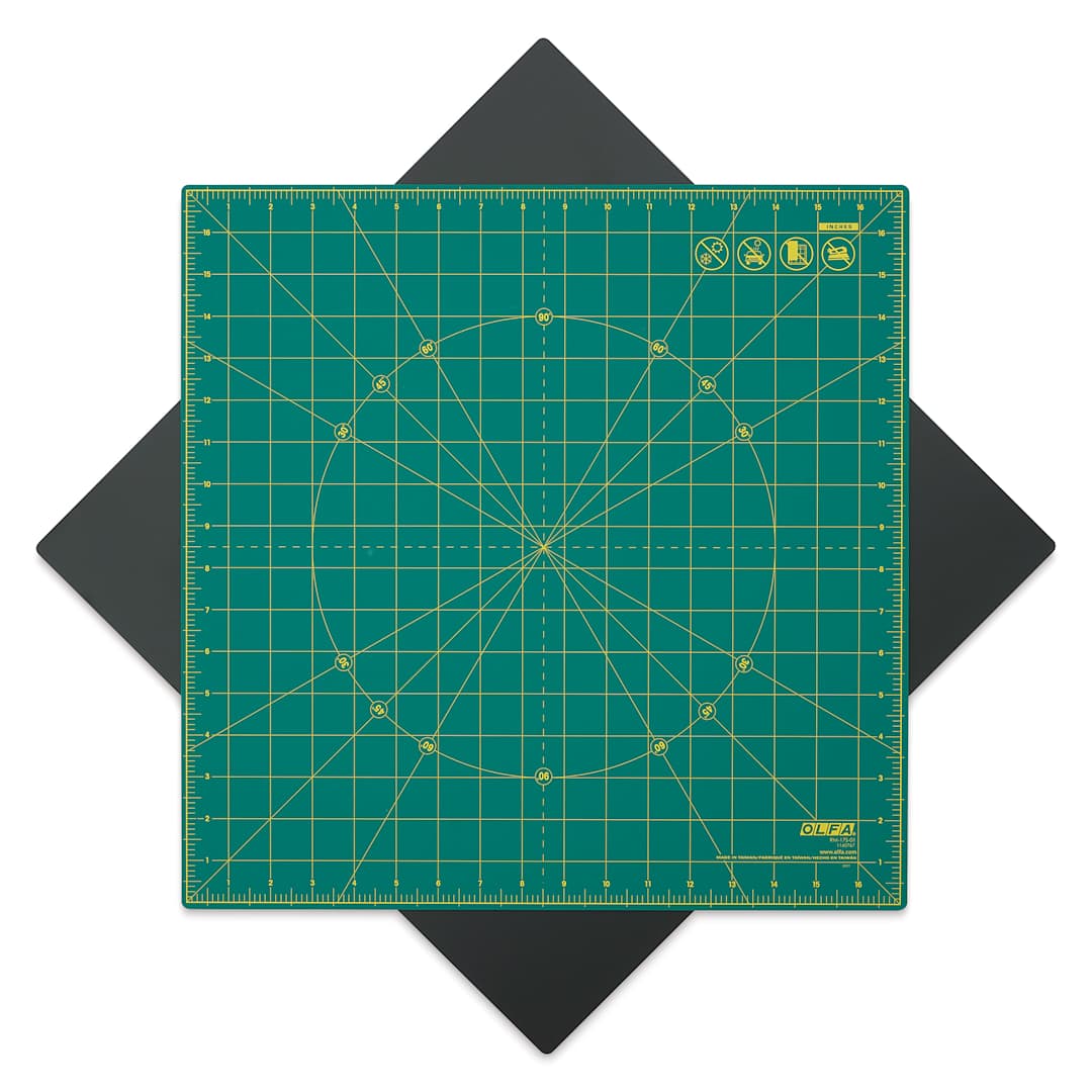 Open in modal - Olfa Rotating Cutting Mat, 17" x 17" - self-healing cutting mat rotated 45° on included non-slipping mat