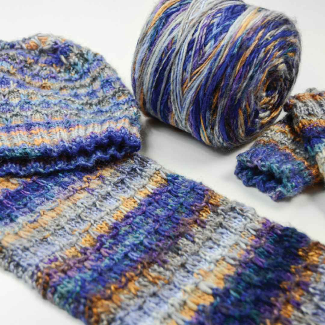 Open in modal - Premier Yarn Spun Colors Yarn - Finished knit hat and scarf with Blue yarn cake