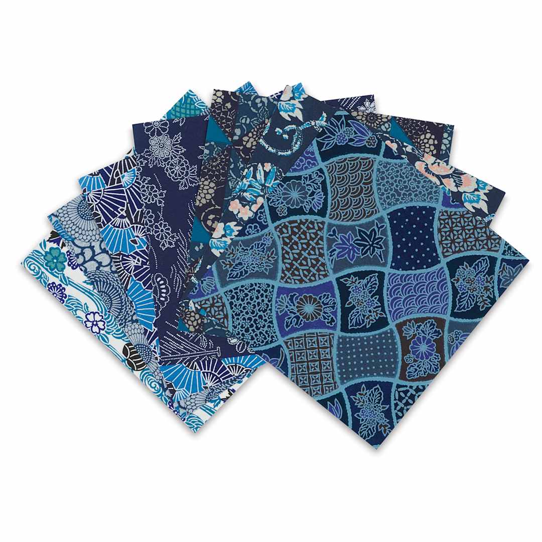 Open in modal - Aitoh Aizome Chiyogami Washi Origami Paper - Blue patterned sheets arranged in fan
