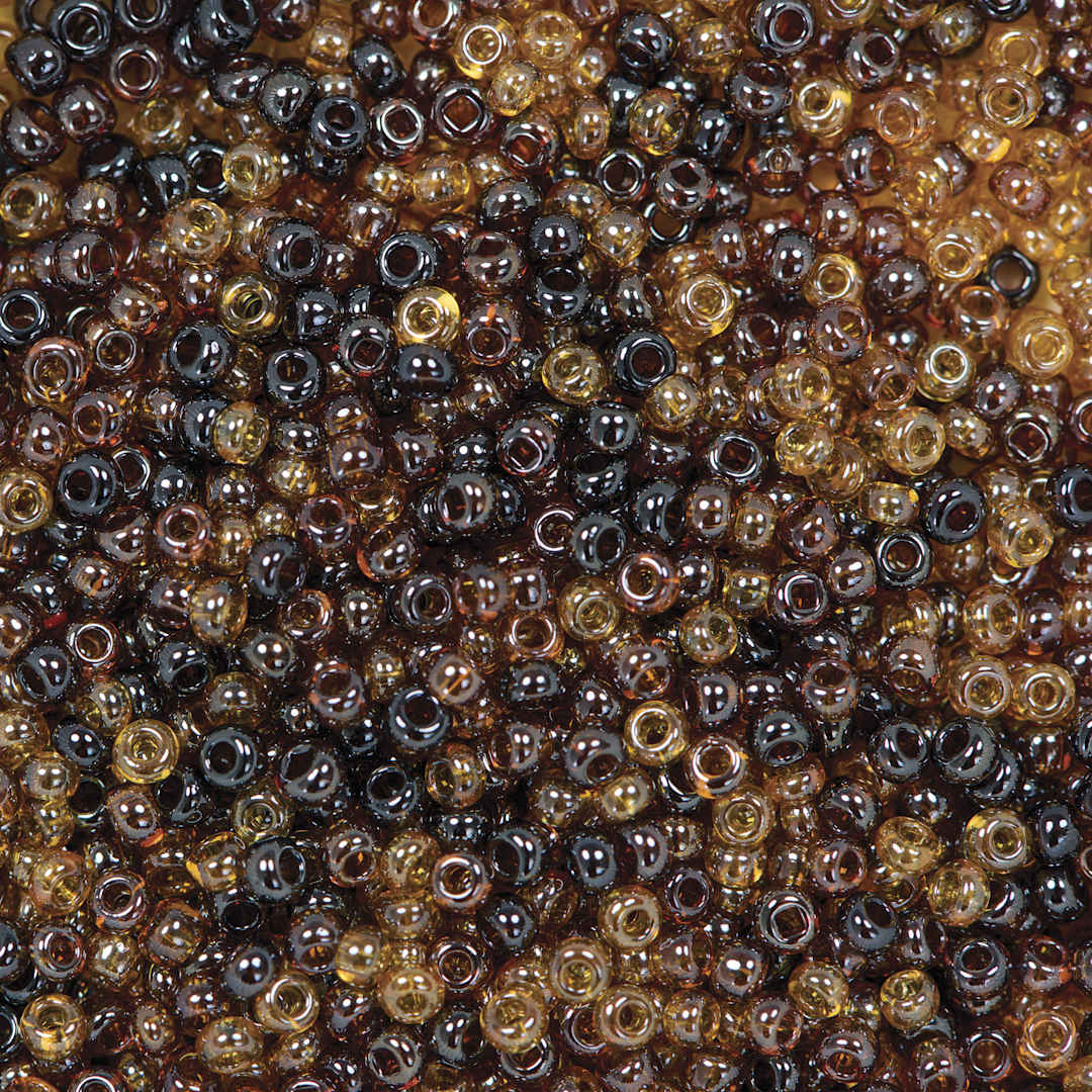 Open in modal - John Bead Czech Glass Seed Beads - Topaz, Luster Mix, 10/0 - close-up