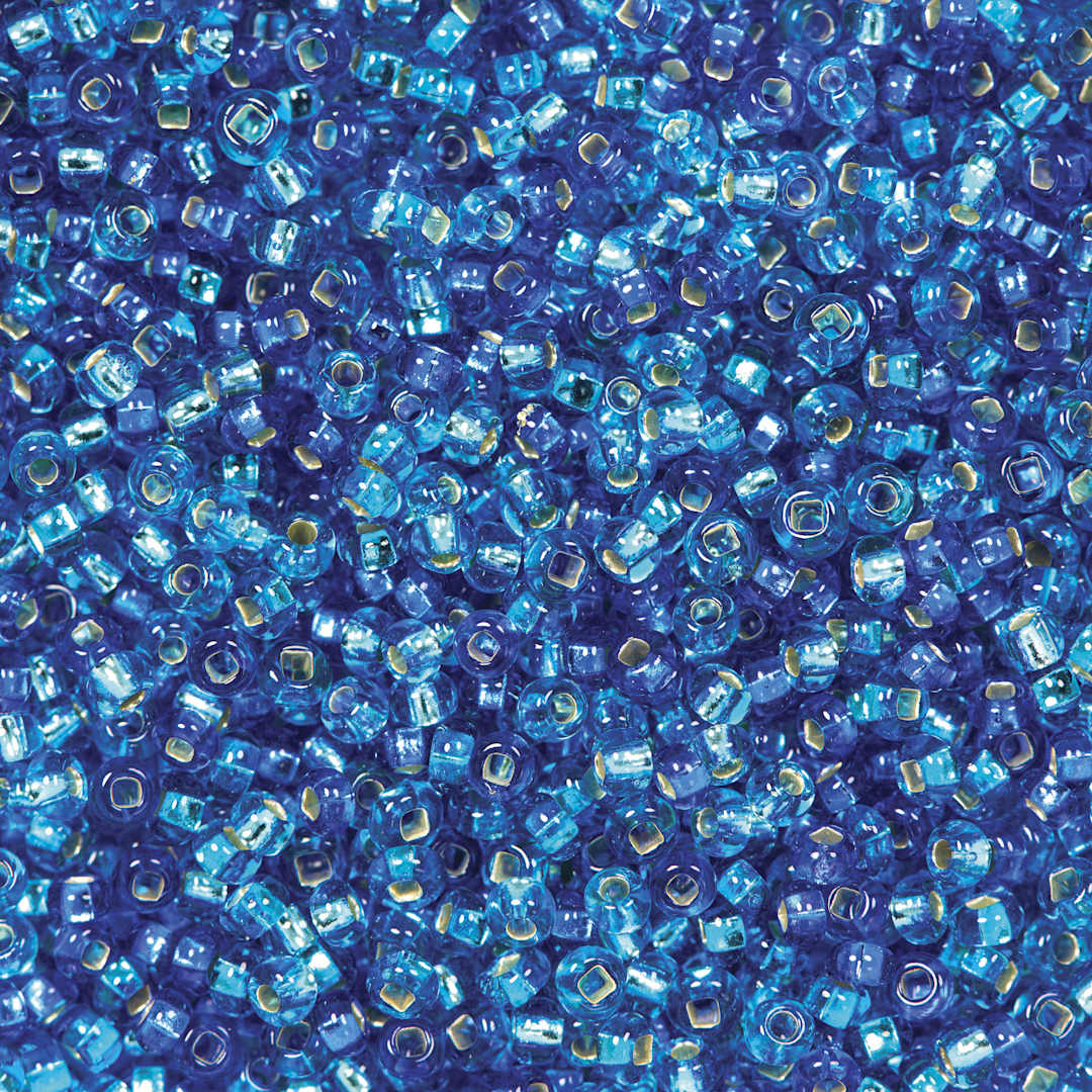Open in modal - John Bead Czech Glass Seed Beads - Aqua, Silver Lined, 10/0 - close-up