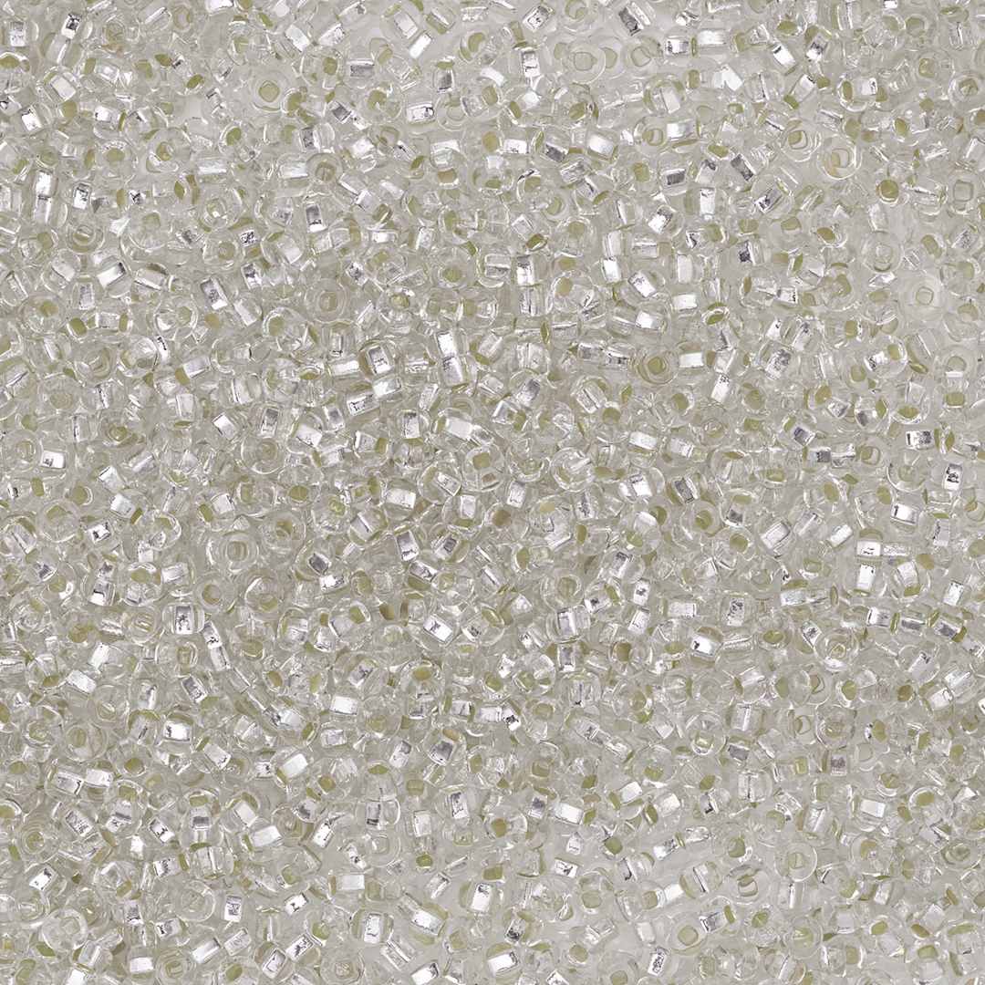 Open in modal - John Bead Czech Glass Seed Beads - Crystal, Silver lined, 10/0 - close-up