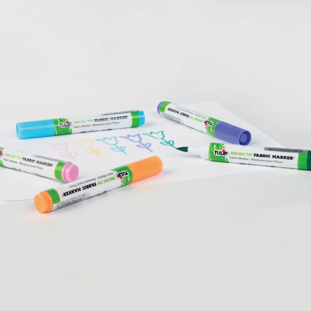 Open in modal - Tulip Brush Tip Fabric Markers (Assorted fabric markers with drawing of flowers)