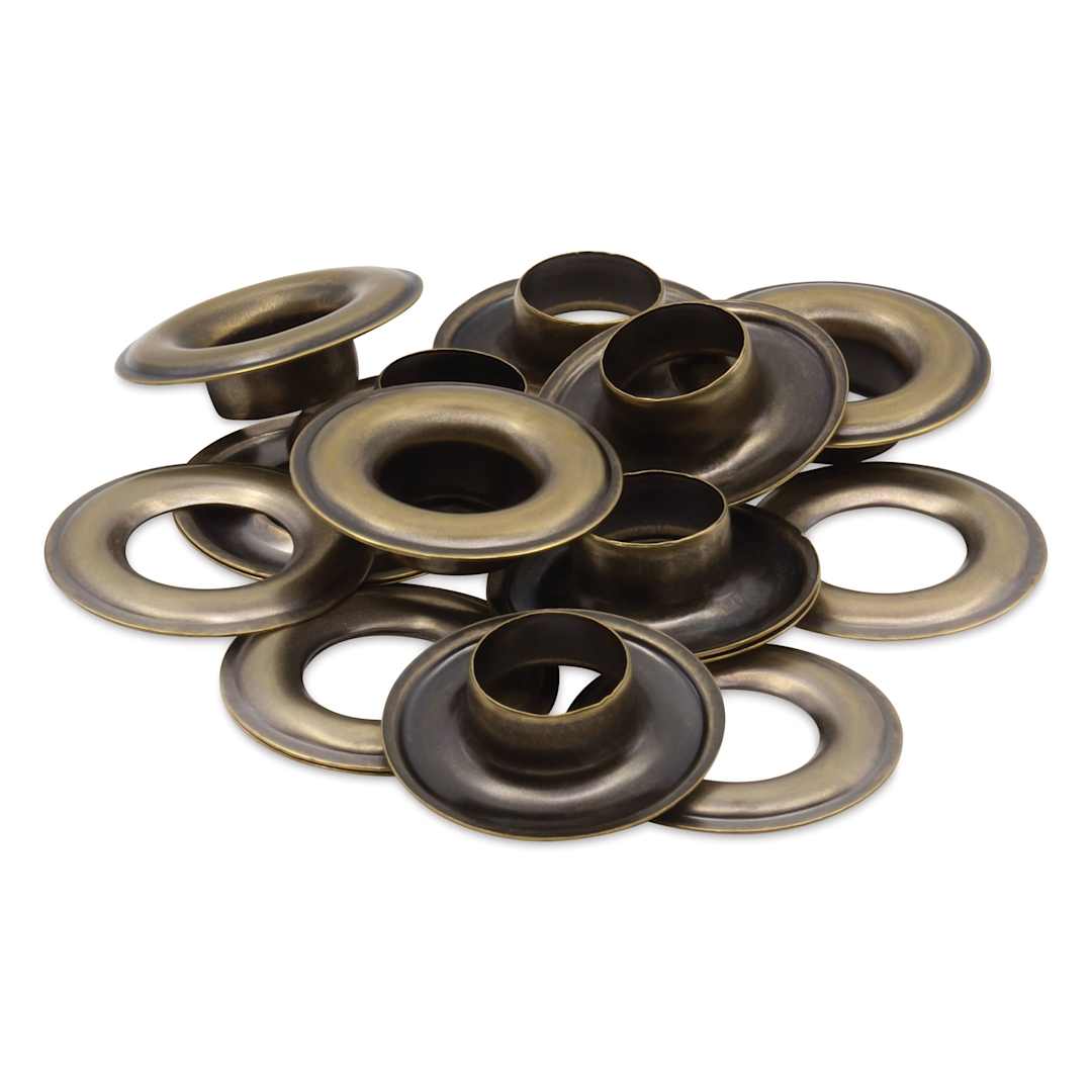 Open in modal - Dritz Grommets - Antique Brass, Pkg of 8, laid outside of the packaging