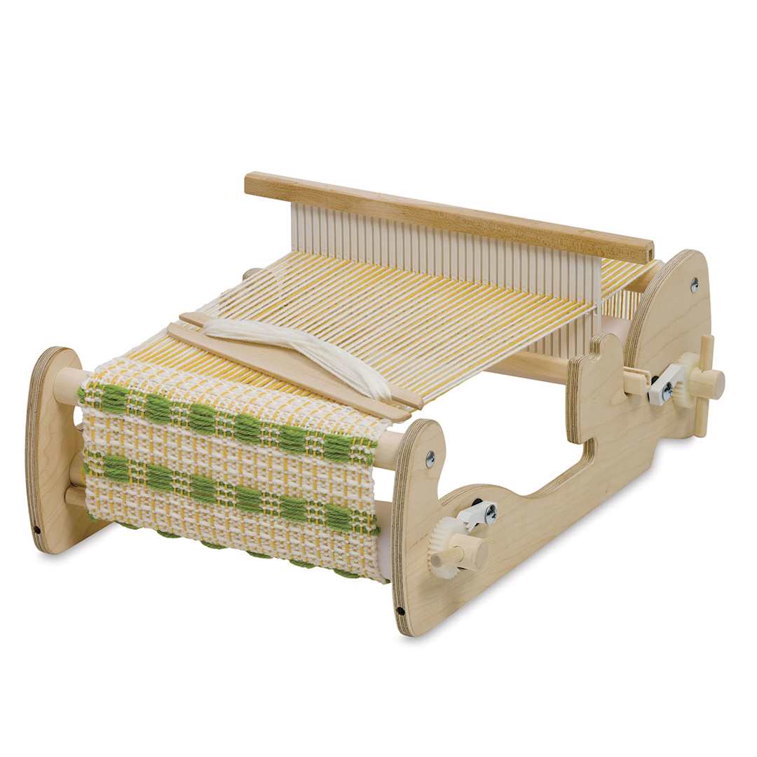 Open in modal - Schacht Cricket Loom - Right angled view of 10" wide loom showing woven fabric