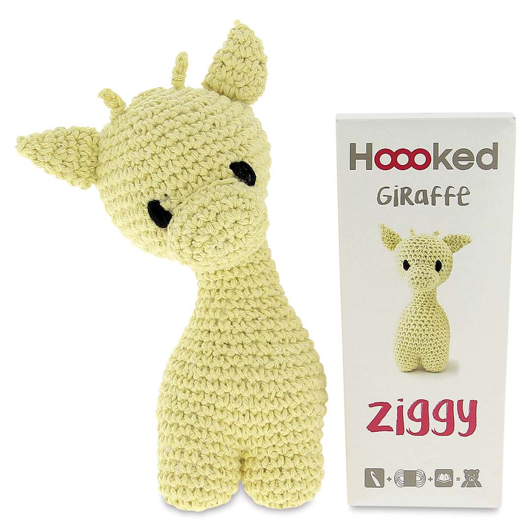Open in modal - Hoooked DIY Animal Crochet Kits - Crocheted Giraffe next to package