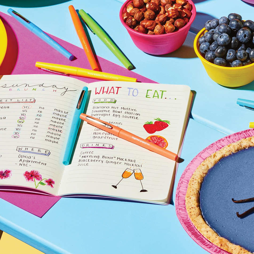 Open in modal - Flair Scented Pens and Sets - Several Pens shown on table with journal and berries