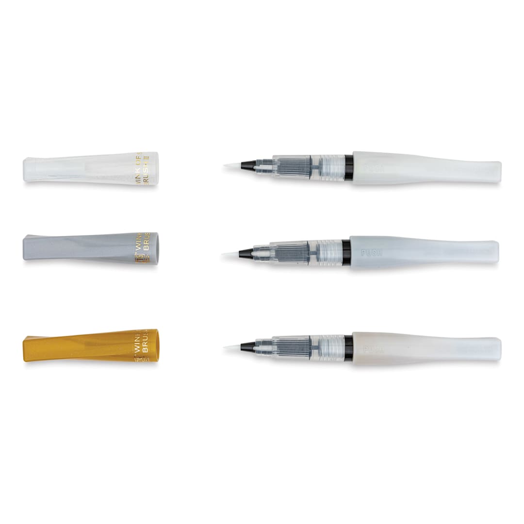 Open in modal - Kuretake Zig Wink of Stella Brush II Pens - Christmas Sparkle, Set of 3 (pens with caps off)