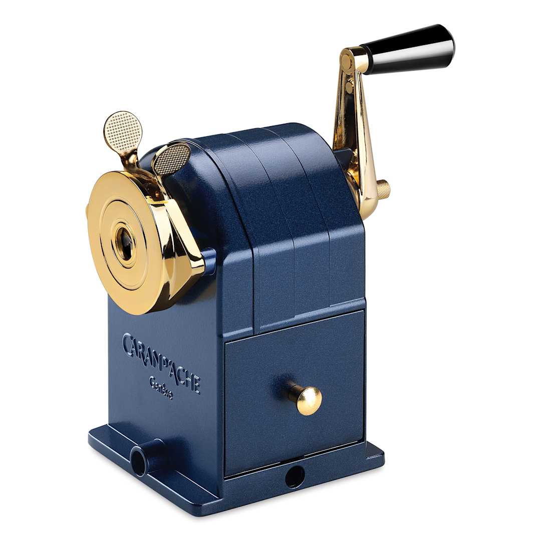 Open in modal - Caran d'Ache Cosmic Blue Pencil Sharpening Machine - Dark Blue, drawer for the pencil shavings shown