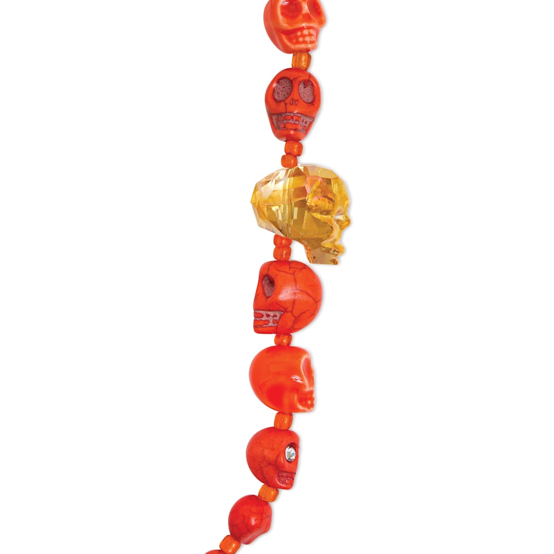 Open in modal - John Bead Assorted Skull Bead Strand - Orange, 6-1/2" Length, close-up
