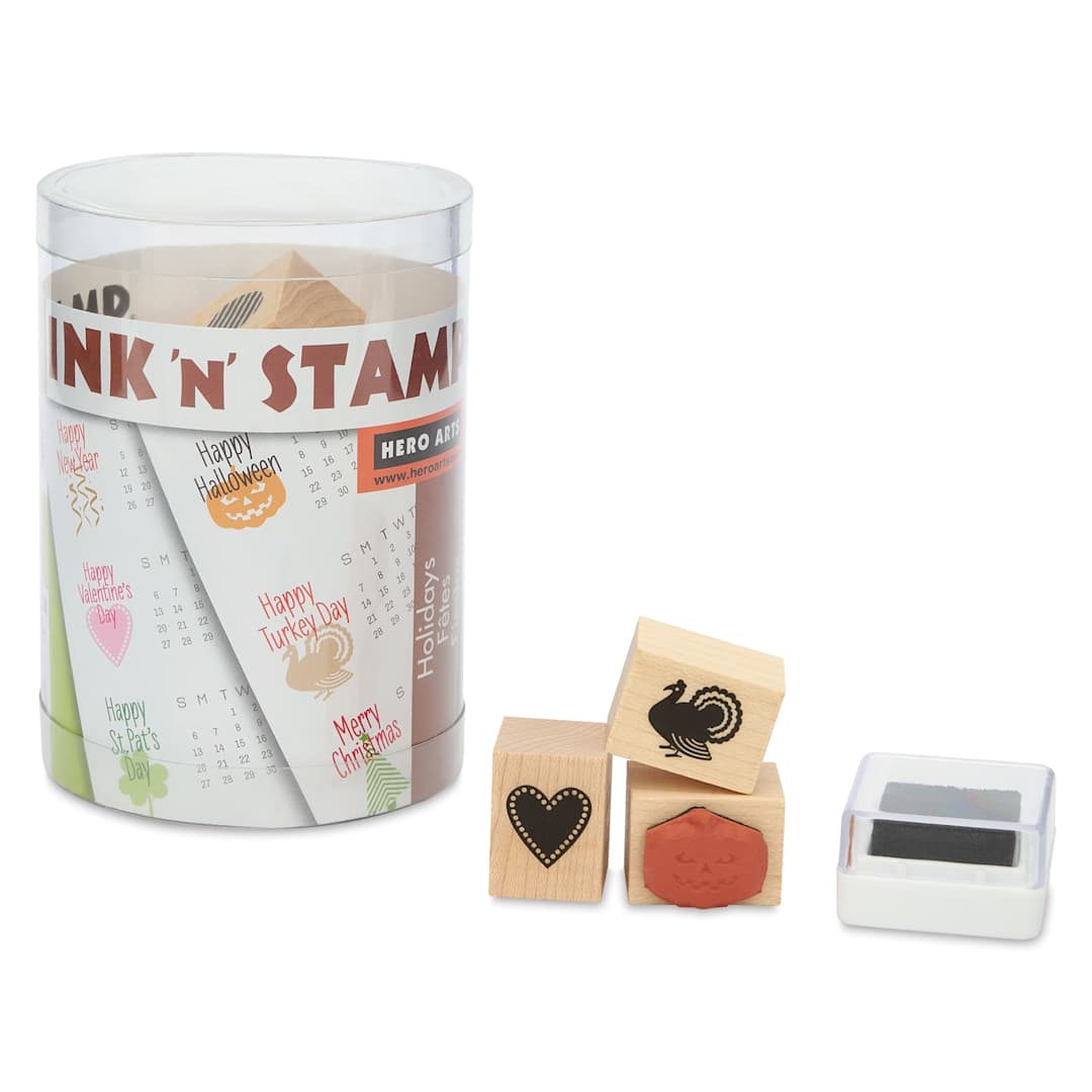 Open in modal - Hero Arts A Year of Holidays Woodblock Ink ‘n’ Stamps Set, several stamps and ink pad next to packaging