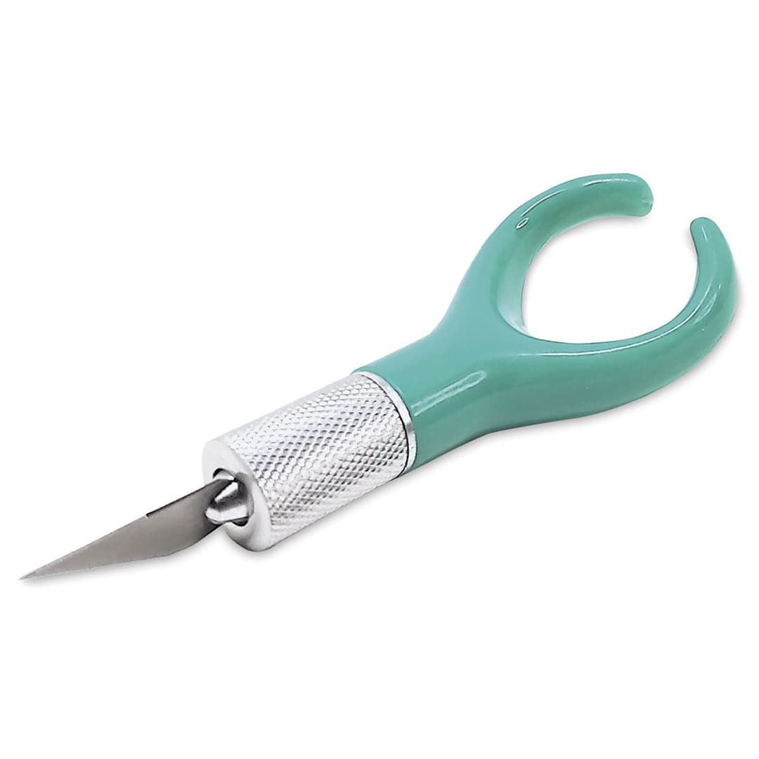 Open in modal - Index Finger Knife - Angled view of Finger Knife
