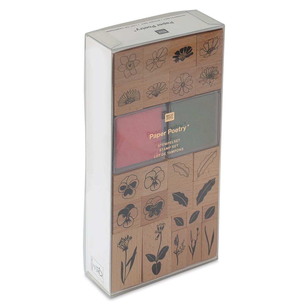 Open in modal - Rico Design Paper Poetry Stamp Set - Flowers, Set of 24, Two Ink Pads - front of packaging, angled view
