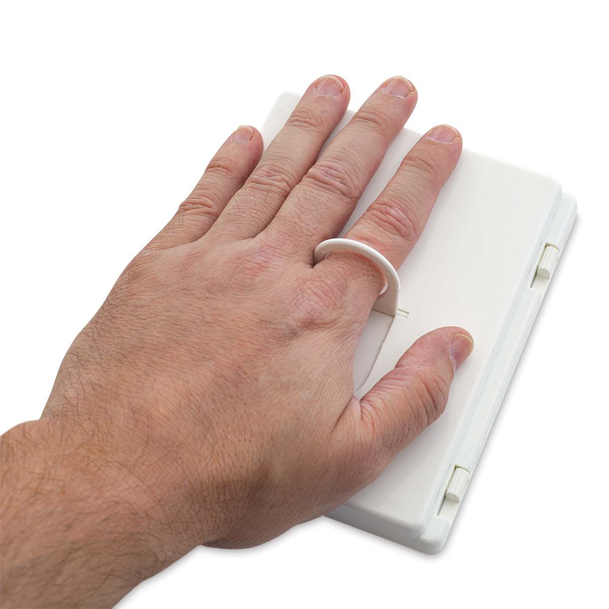 Hand showing ring on a closed set.
