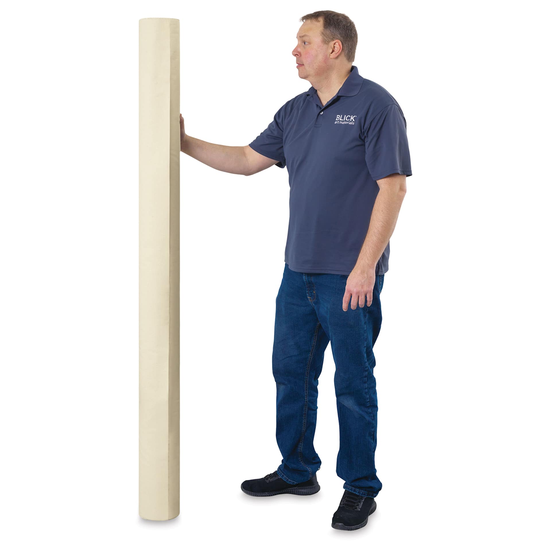 Blick Medium-Weight Unprimed Cotton Canvas by the Yard - 64-1/2" x 1 yard, man standing next to roll