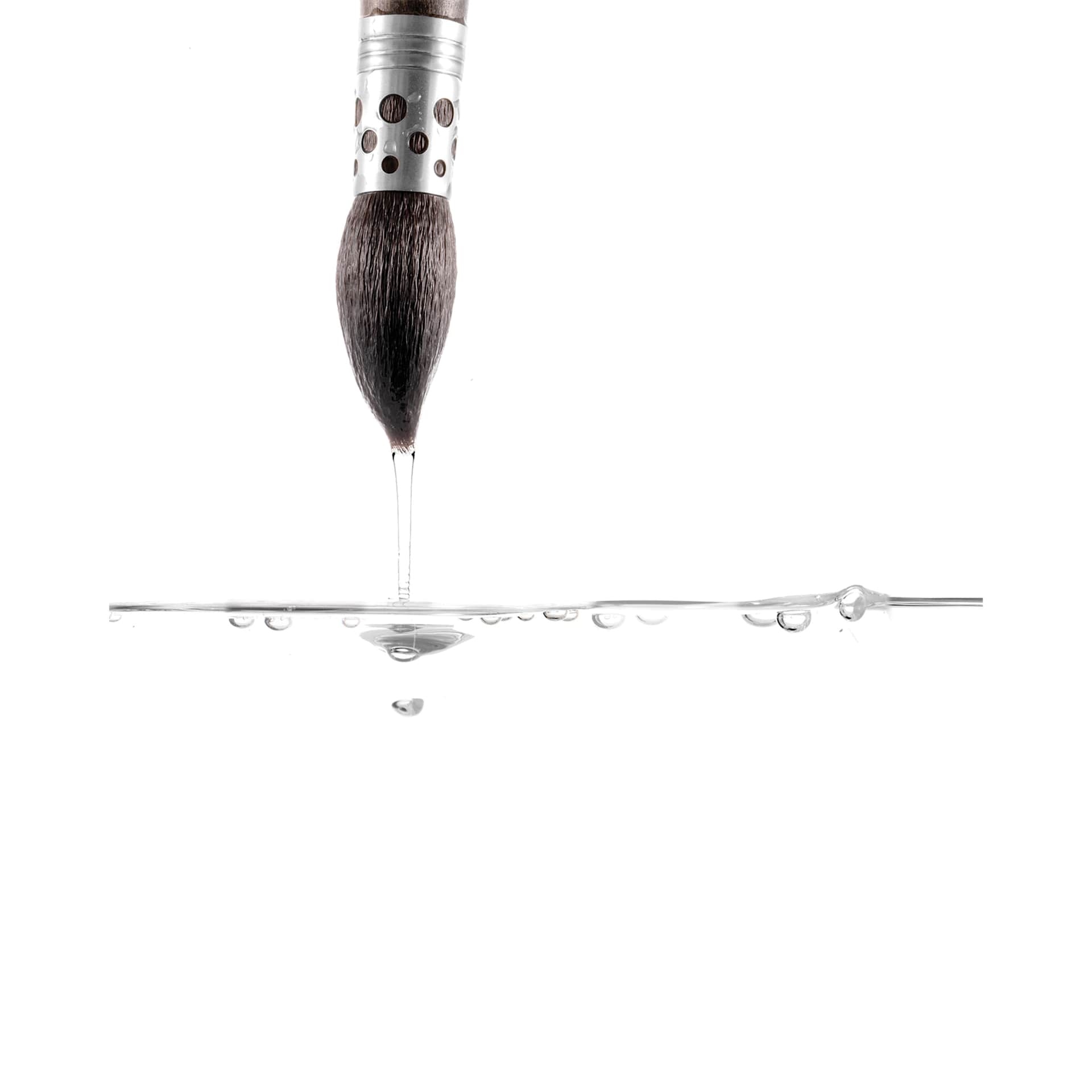 Escoda Último Evolution Brush, being pulled out of water