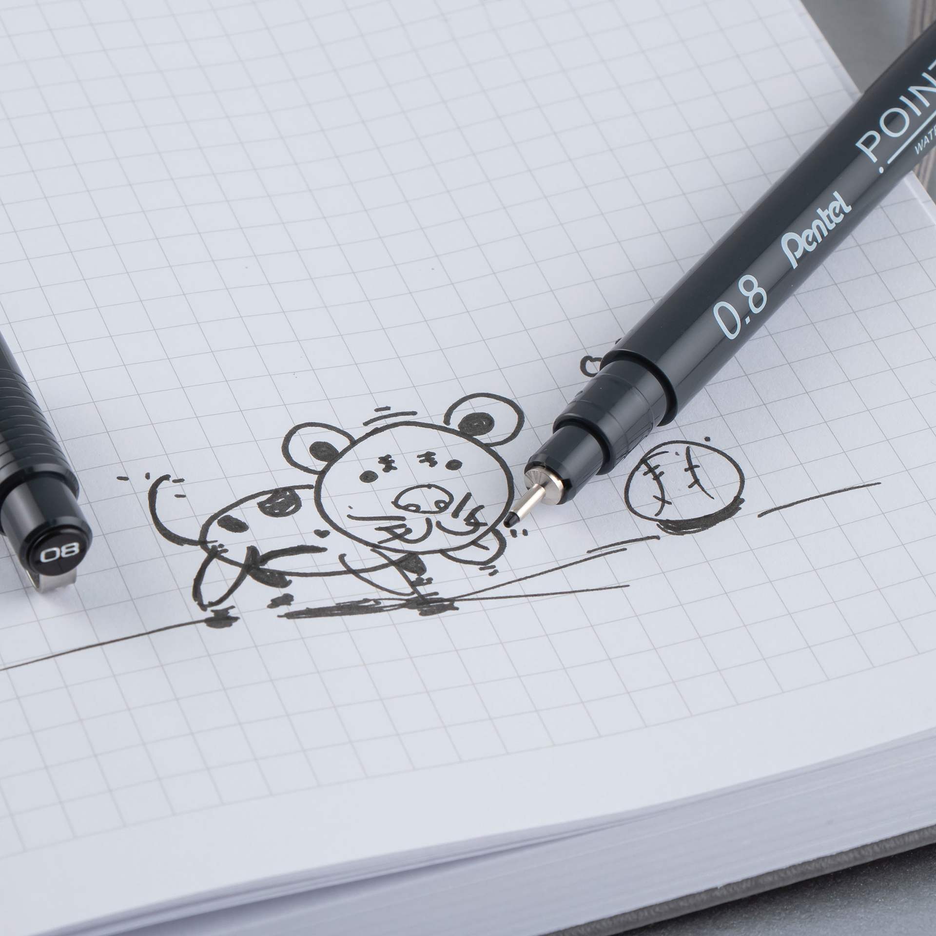 Pentel Arts Pointliner Pen - Black, 0.8 mm (being used to draw an animal)
