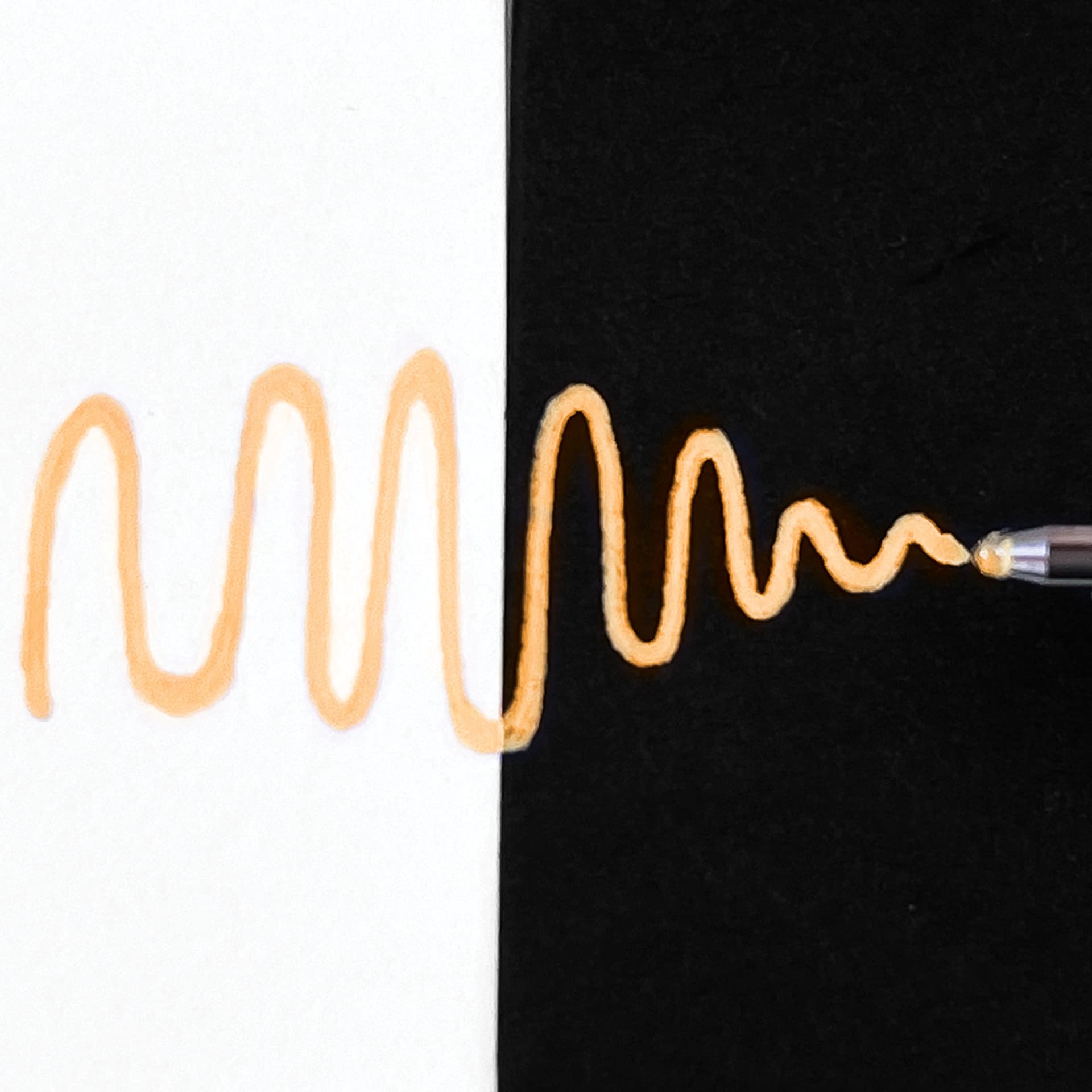 Sakura Gelly Roll Moonlight Pen - Pastel Orange, Bold Point on black and white paper comparison