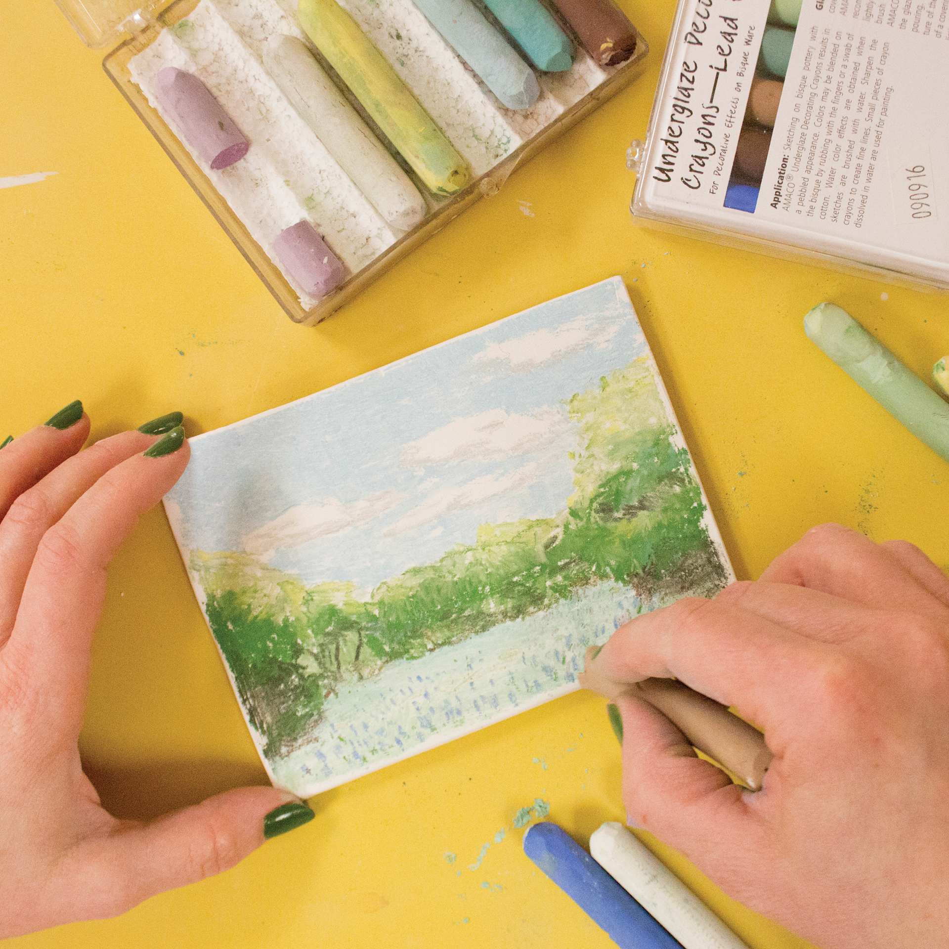 Amaco Lead Free Underglaze Chalk Crayons applied to paper to illustrate landscape