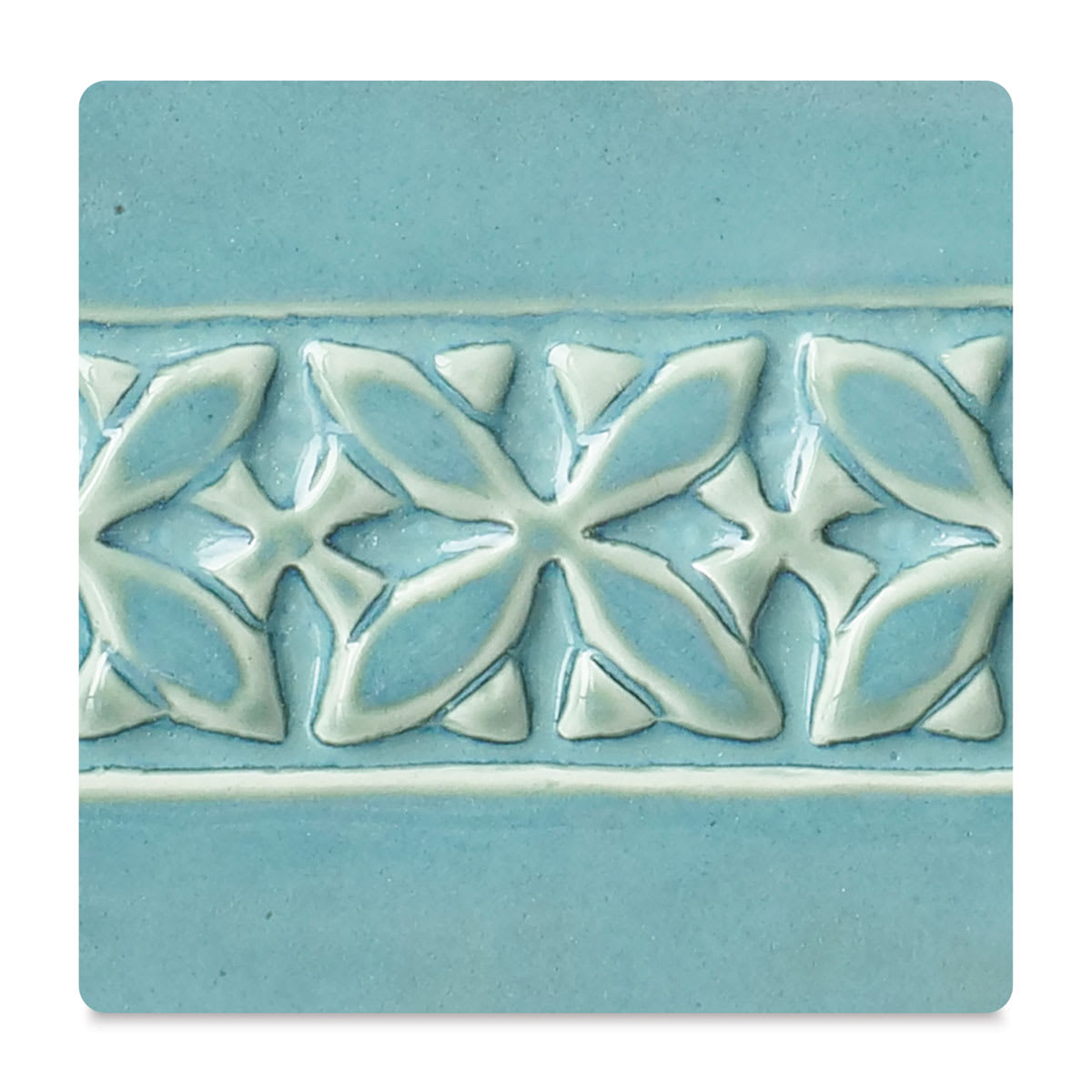 Amaco Potter's Choice Glazes - Blue Lagoon, PC-26. Color sample in blue with cream outlines.