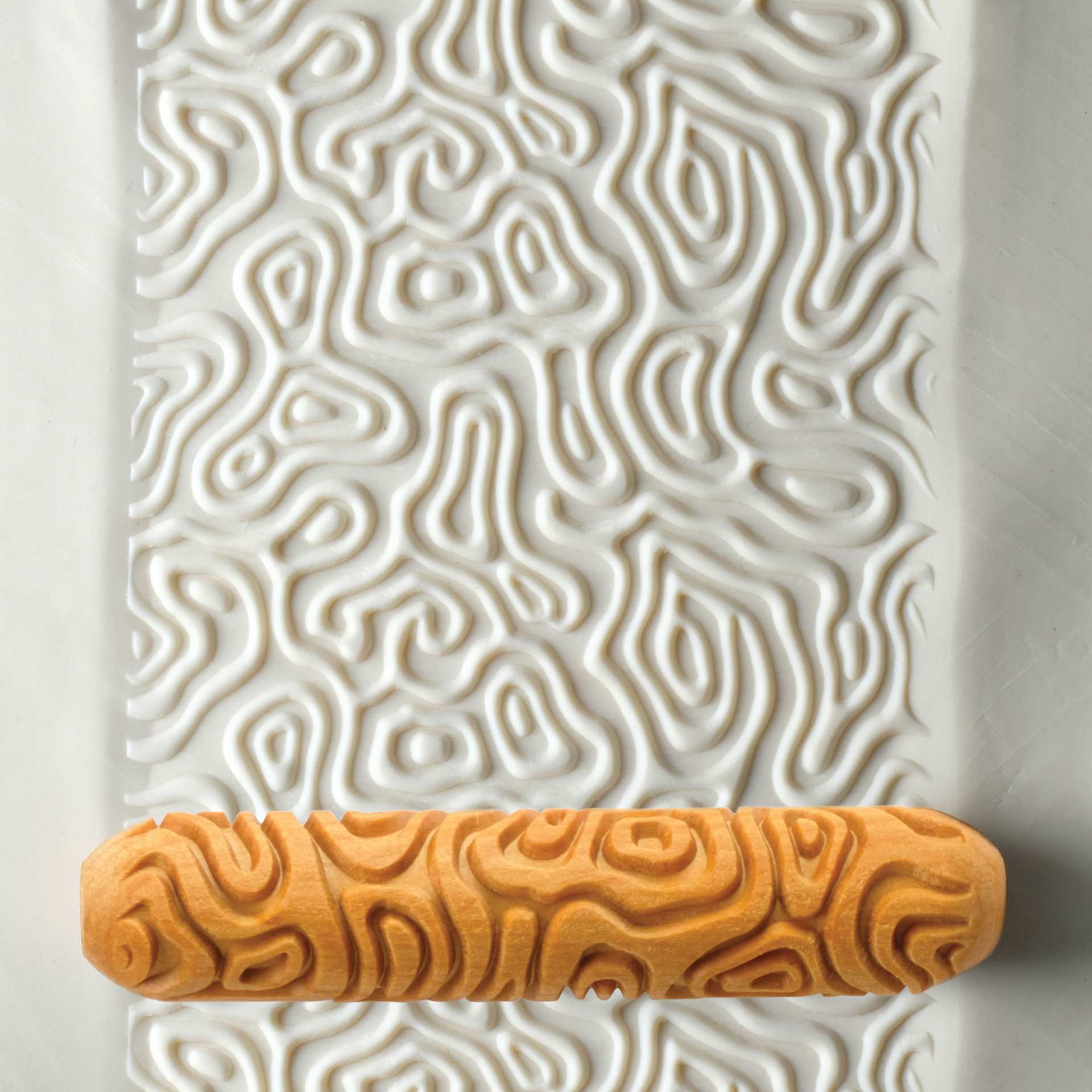MKM Pottery Tools Big Hand Roller - Topographic applied to clay