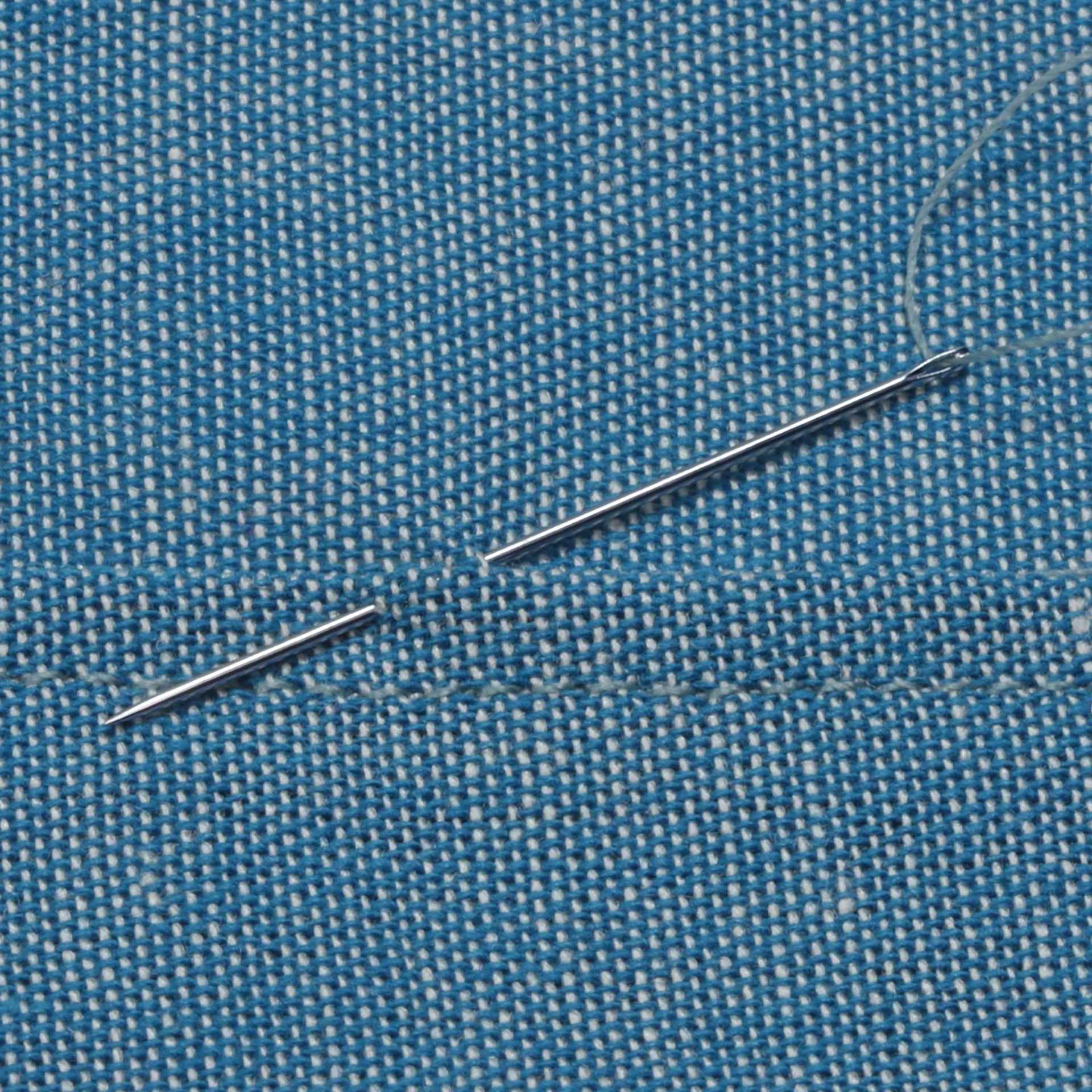 Dritz Sharps Hand Needles - Size 9, Pkg of 20 close-up of needle on fabric