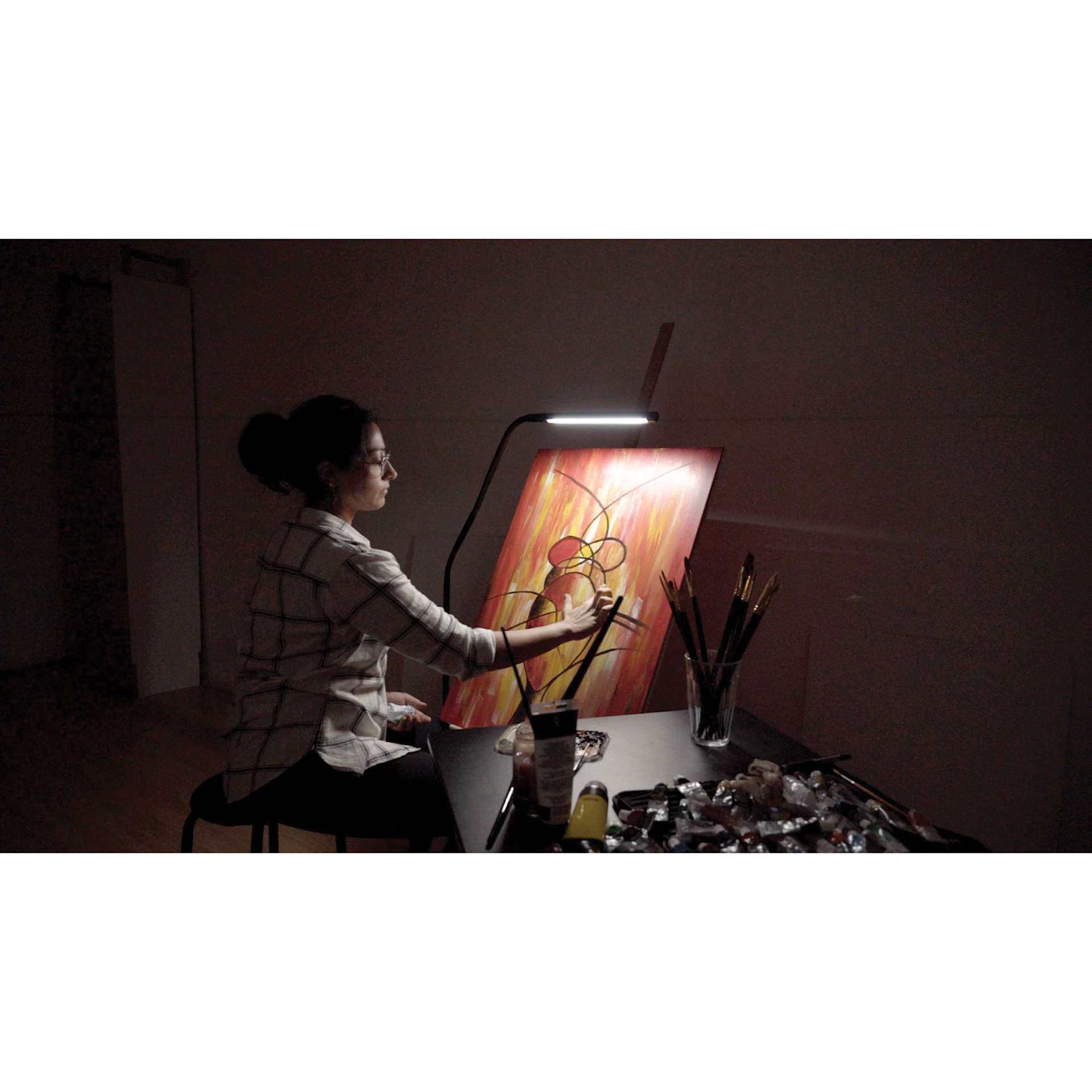 Daylight Electra Floor Lamp 6000 K light setting in use in dark studio
