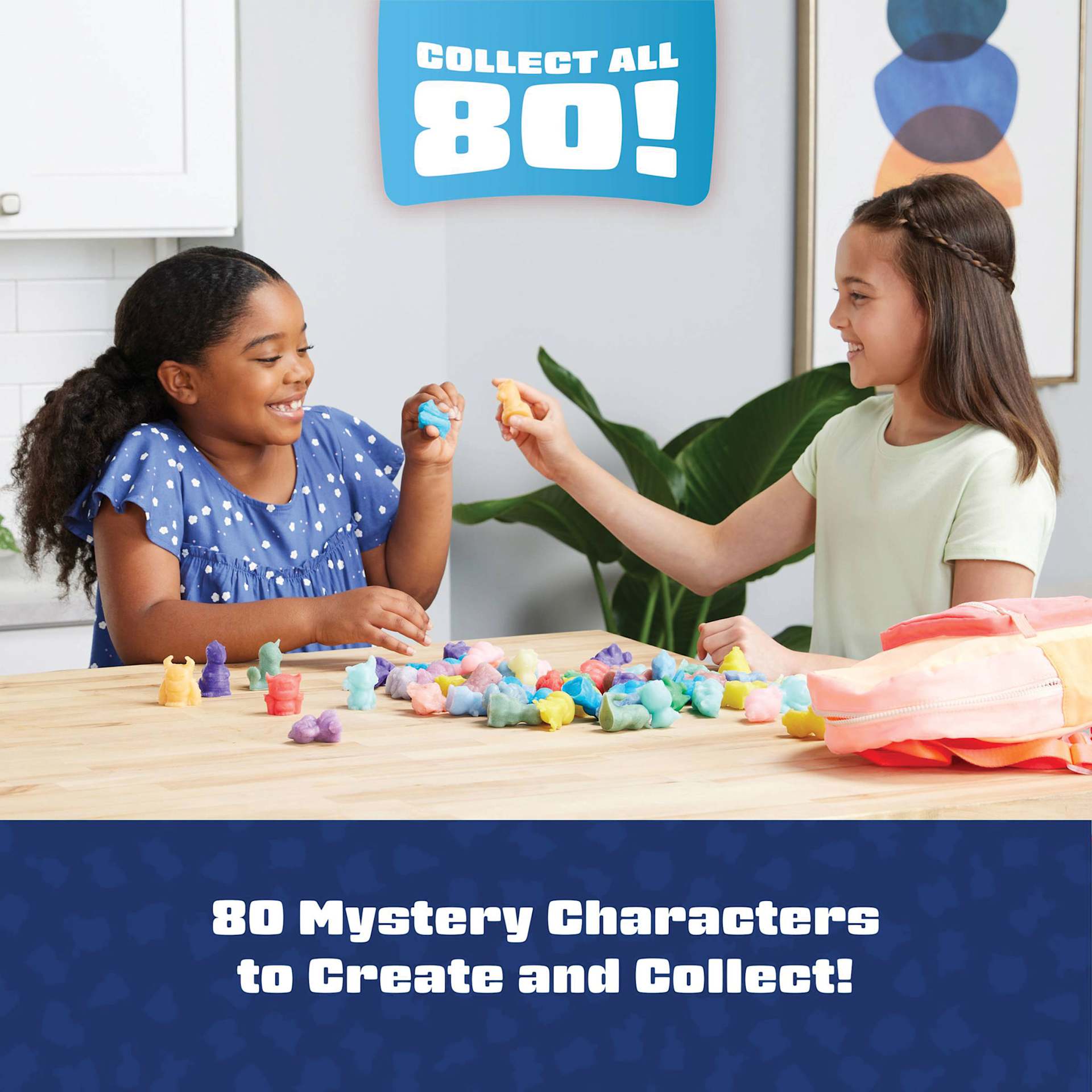 Elmer's Squishies Kits, two youth exchanging collectable Mystery Characters