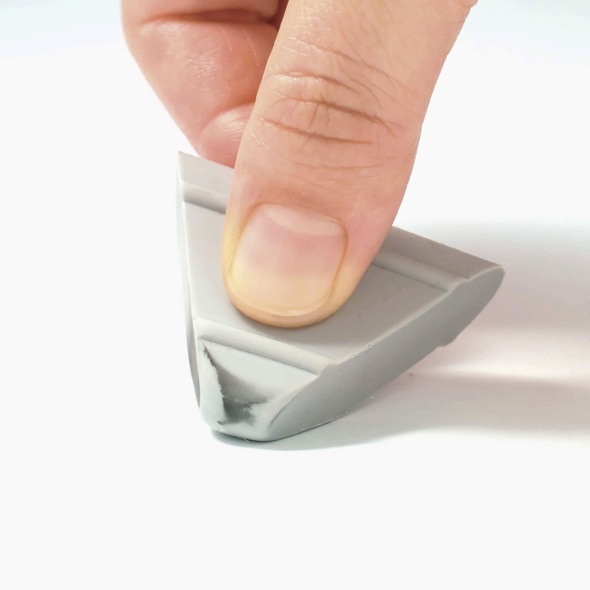 Object Index Mangaka Eraser - Triangular, in hand and in use