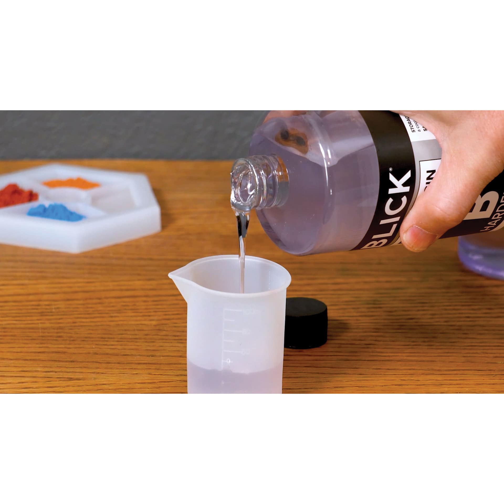 Blick Epoxy Resin Kits, cup being filled with hardener
