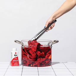 Rit All Purpose Liquid Dye - Scarlet, 8 oz, submerging fabric in dyed water