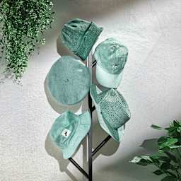 Rit All Purpose Liquid Dye - Sage, 8 oz, dyed hats hanging on rack