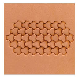 Embossed leather tinted with Realeather One Step Leather Dressing in Saddle Tan