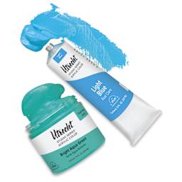 A jar and a tube of Utrecht Studio Series Acrylics spilling paint.