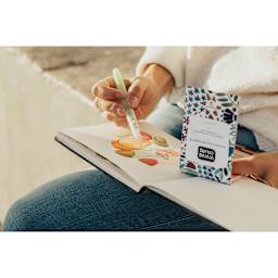 Viviva Colorsheets - Single Set, Assorted Colors (person using colorsheets to in sketchbook)