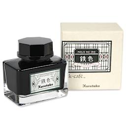Kuretake Ink Cafe Meiji No Iro Pen Ink - 534 Slate Green (Kuroganeiro), jar next to packaging box