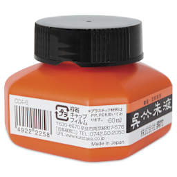 Kuretake Shueki Vermilion Calligraphy Ink - 60 ml, side of the jar