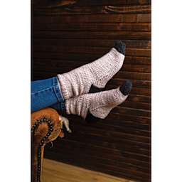 Lion Brand Feels Like Heaven Yarn, person wearing socks made of yarn