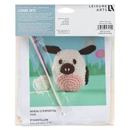 Leisure Arts Make a Little Pudgie Crochet Kit - Cow, back of the packaging