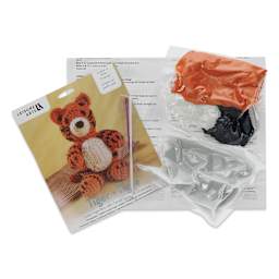 Leisure Arts Make a Little Friend Crochet Kit - Tiger, contents laid out