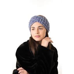 Lion Brand Basic Stitch Anti-Microbial Thick & Quick Yarn, adult wearing headband made with yarn