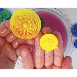 Paint Puck Mini Brush Cleaner -Shown before and after soaking in solvents