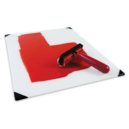 New Wave Posh Glass Tabletop Palette - Red paint rolled on top of the white palette