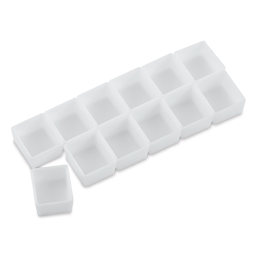 Blick Empty Watercolor Half Pans, - Angled view of 12 Half pans in two rows