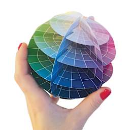 Kolormondo 3-D Color Wheel - Artist holding completed Color Wheel Globe