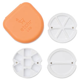 Closed Etchr Travel Pocket Palette case, BLICK Exclusive, in Amber with 3 interchangeable palettes