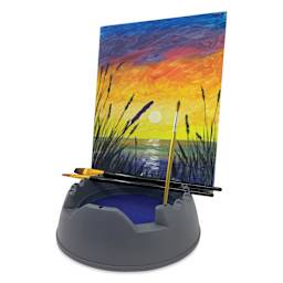 GoEasel Painting Station - Charcoal Gray, holding finished artwork