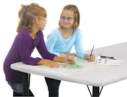 Kwik-Cover Tablecloths - 2 students painting with watercolors on covered table
