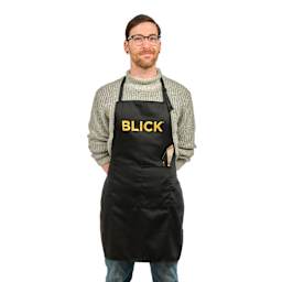 Front view of Blick Classic Black Apron with Logo on a person