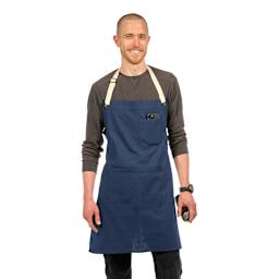 Front view of Blick Artisan Apron - Midnight Blue on a person